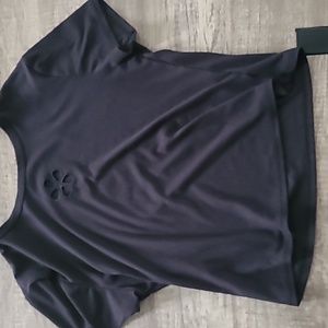A black t-shirt with a flower cut out